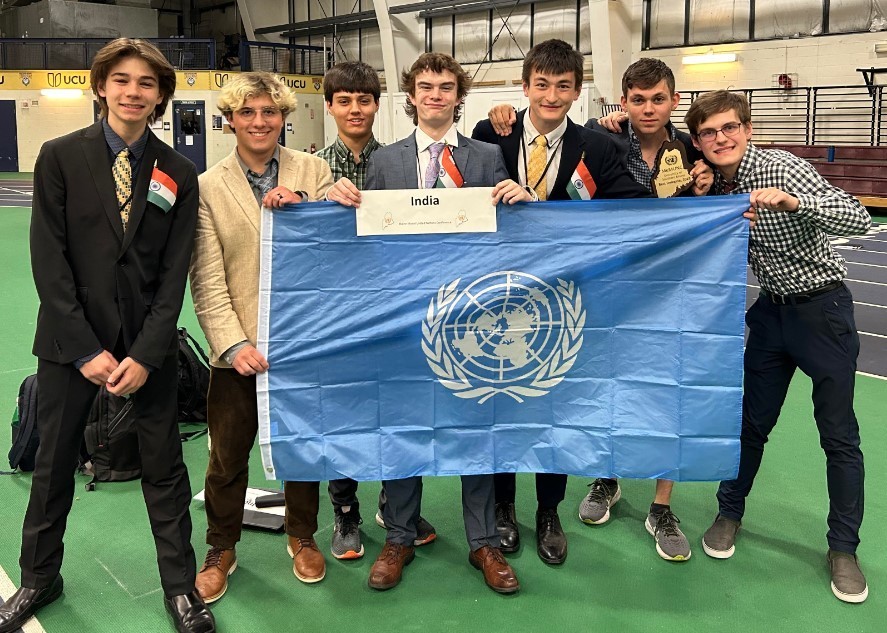 Model UN Team with banner