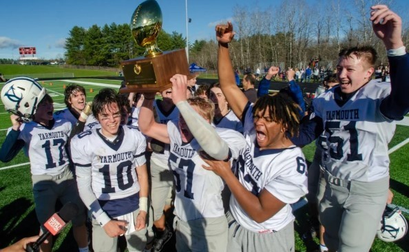 Players posing with trophy, courtesy of Michael Hoffer