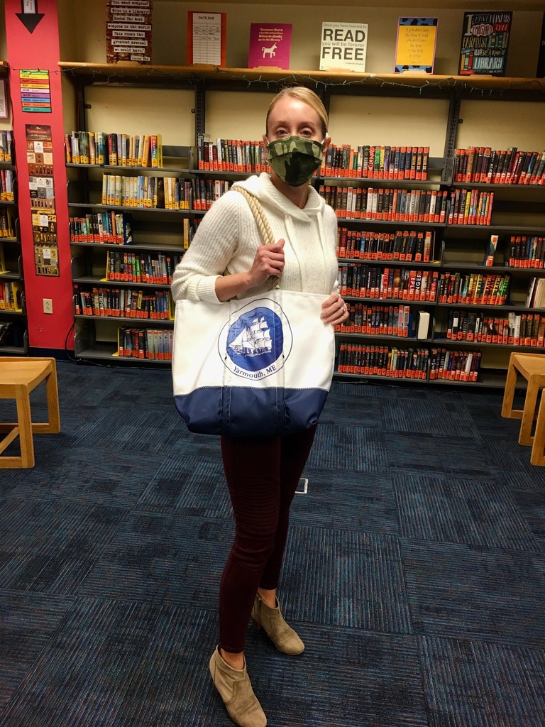 Mrs. Myers showcases a Yarmouth Sea Bag, one of our fundraising items.