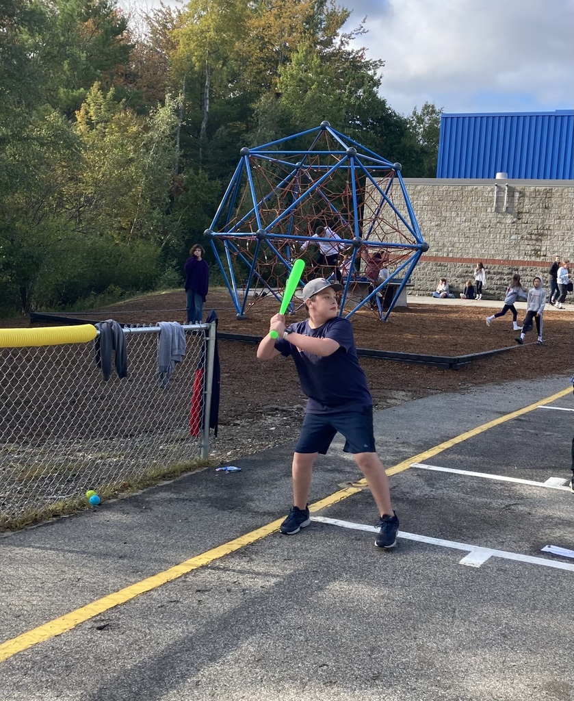 7th grade student playing whiffle ball