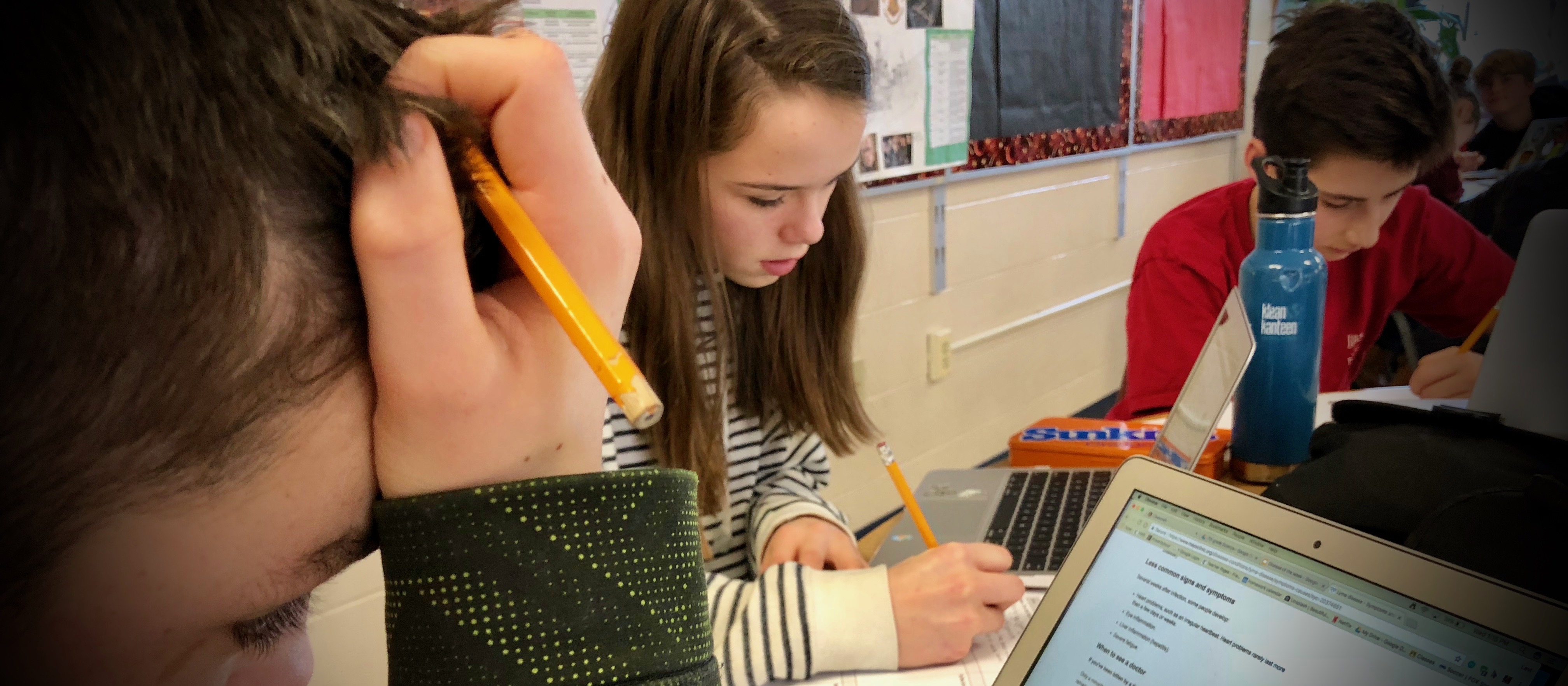 Students in Mrs. Medenica's classroom working on an assingment.