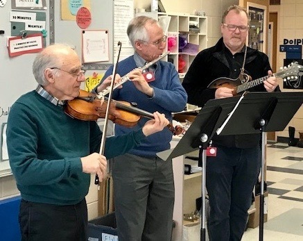 Chris Moore (mandolin),  Whit  Ford, Flute (flute and fife), and Are Dedekian, (fiddle) 