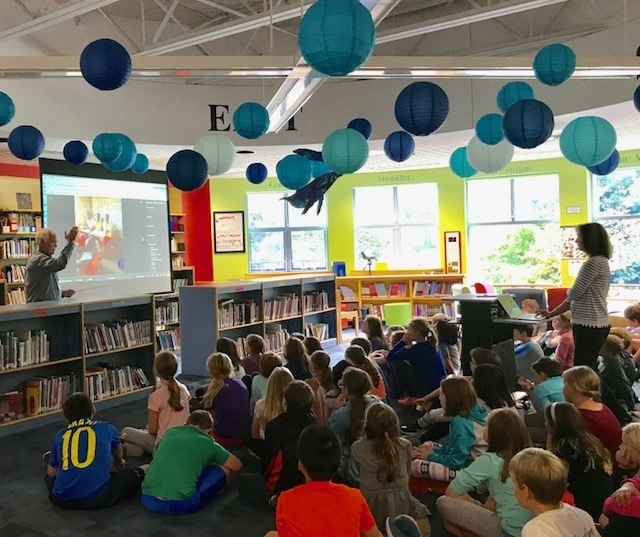 Charlie Roscoe visits with 5th grade students